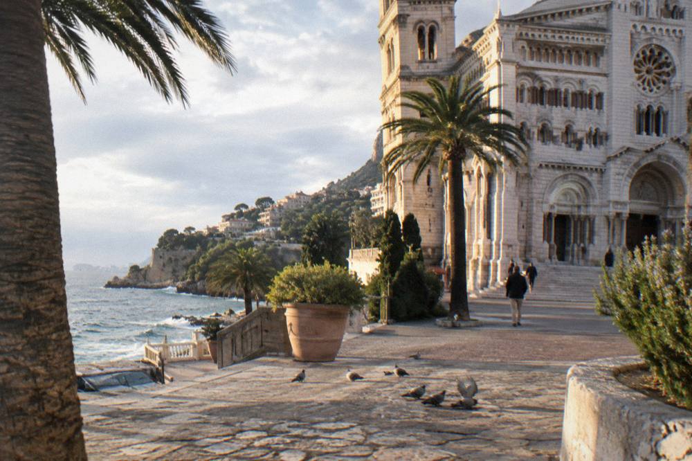 Monaco harbor and old town rooftops in warm autumn afternoon light