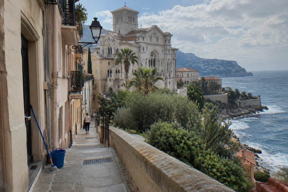 Narrow stone street on the Rock of Monaco with old buildings