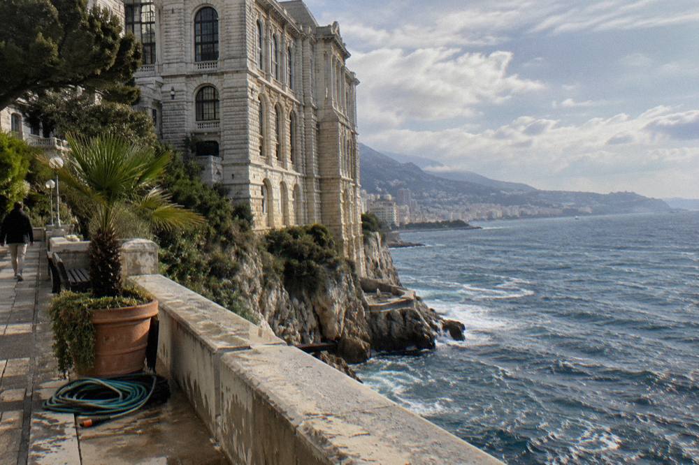 Morning light on a coastal road with cliffs above the Mediterranean