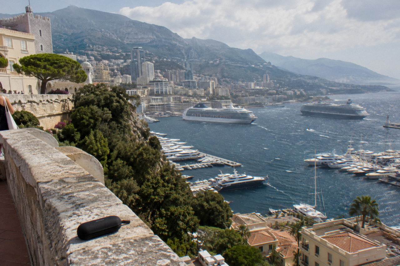View over Monaco harbor from the Rock with cruise ships and hillside buildings