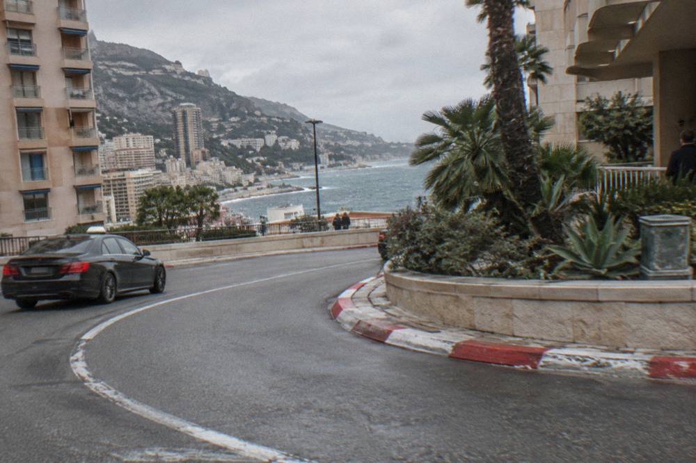 Traffic negotiating the tight Fairmont hairpin corner beside the hotel entrance