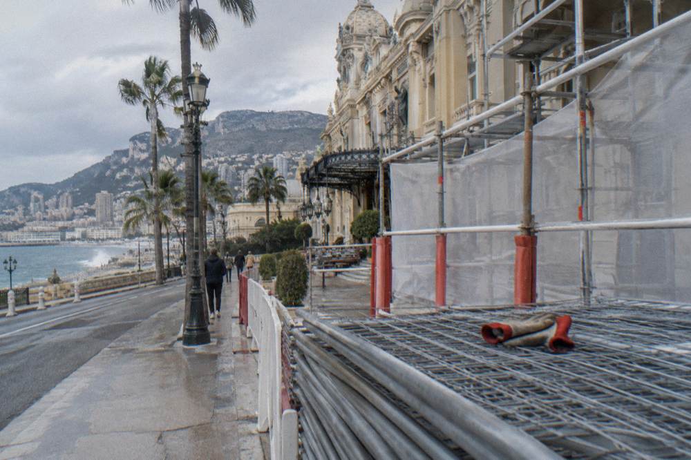 Grandstand scaffolding and barriers built along a Monte Carlo street before race weekend