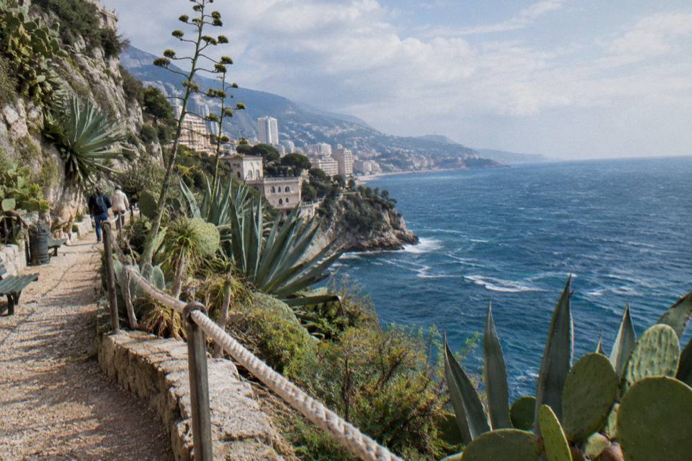 Mediterranean coastline seen from a high vantage point with blue water and distant headlands