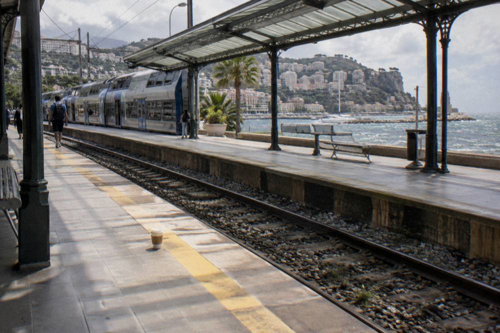 Coastal road winding along the French Riviera between Nice and Monaco with Mediterranean sea