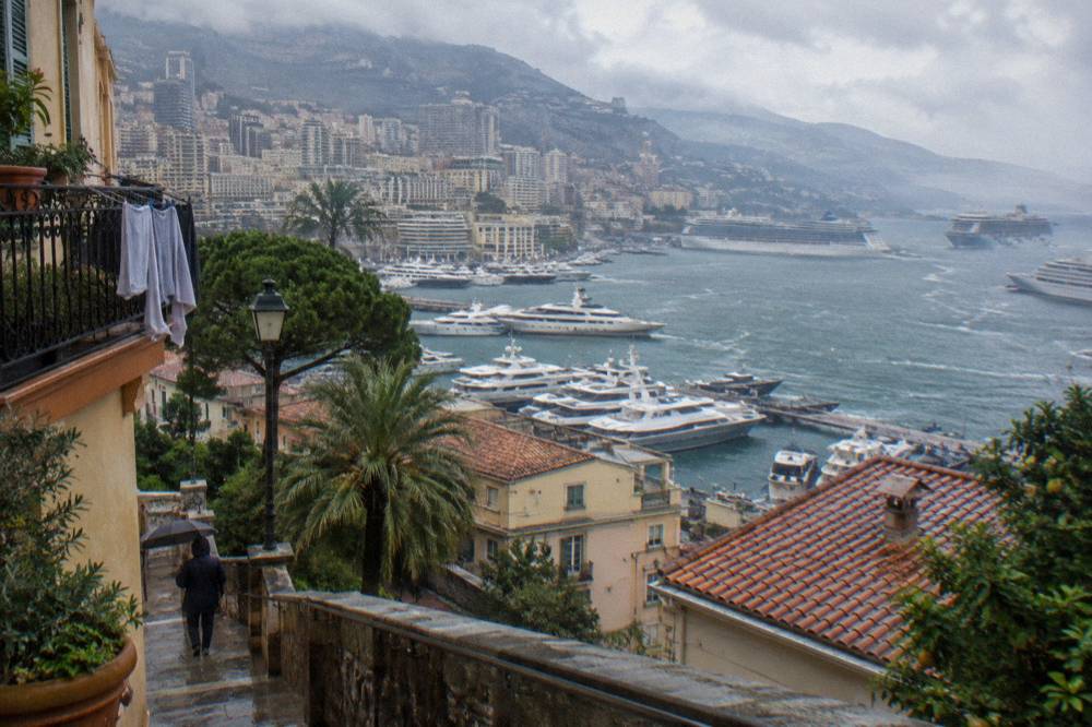 Cruise ships and yachts moored in Port Hercule seen from the Monaco hillside