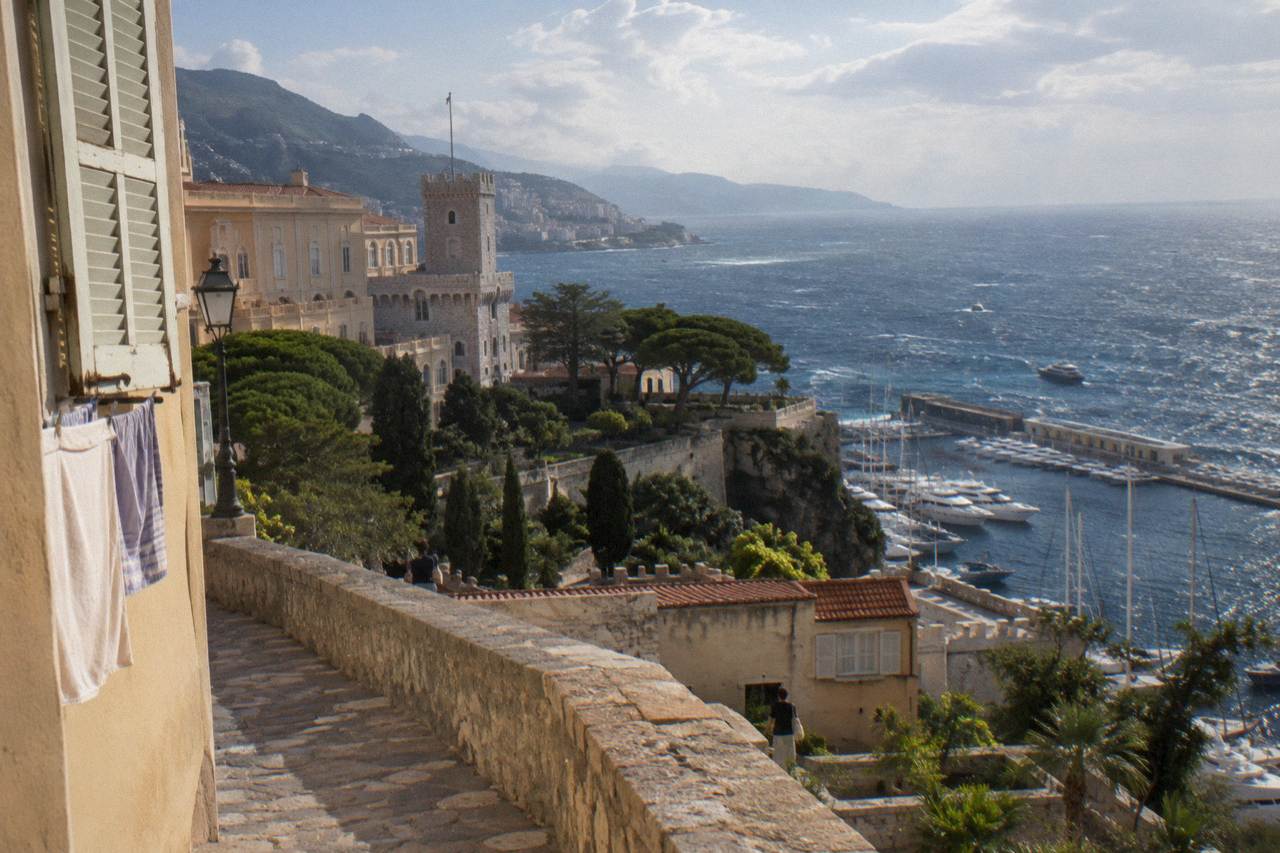 The old town of Monaco on the Rock above the Mediterranean with the port below