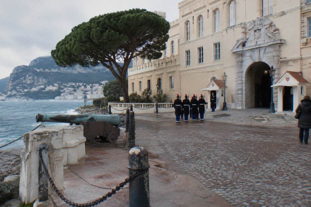Guards in ceremonial uniform in front of the Prince's Palace of Monaco
